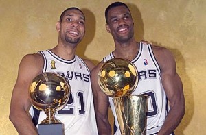 Duncan and Robinson pose with trophies